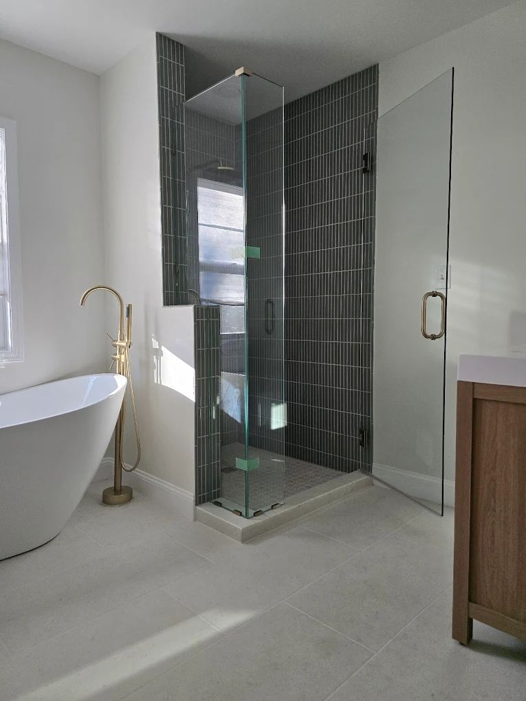 Bathroom renovation, frameless glass shower, stone bench and marble tile, Overland Park KS